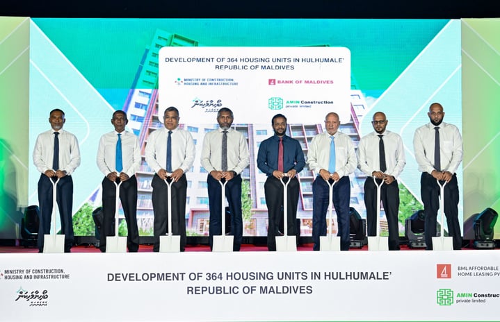 Minister of Housing Muttalib, senior officials of the bank, and senior officials of Amin Construction posing for a photo at the ceremony held tonight to officially launch the affordable housing project being built by BML in collaboration with Amin Construction.